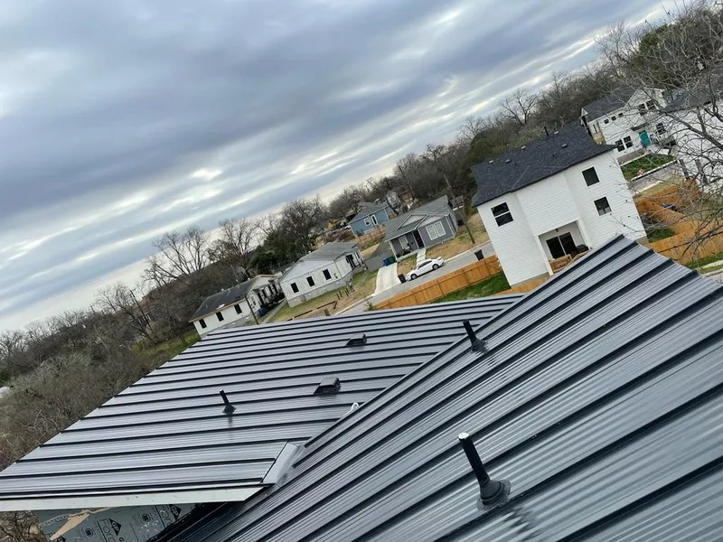 Standing seam metal roof panels with vents for Skylight Repair in Othello